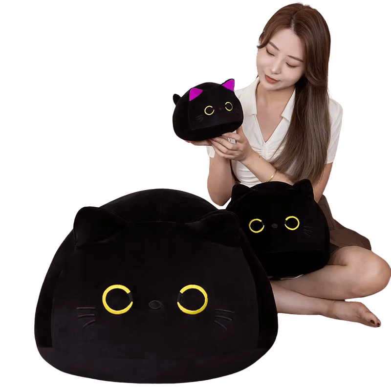 Plush toy with pink ears being held, size reference shown β Midnight Meow plush