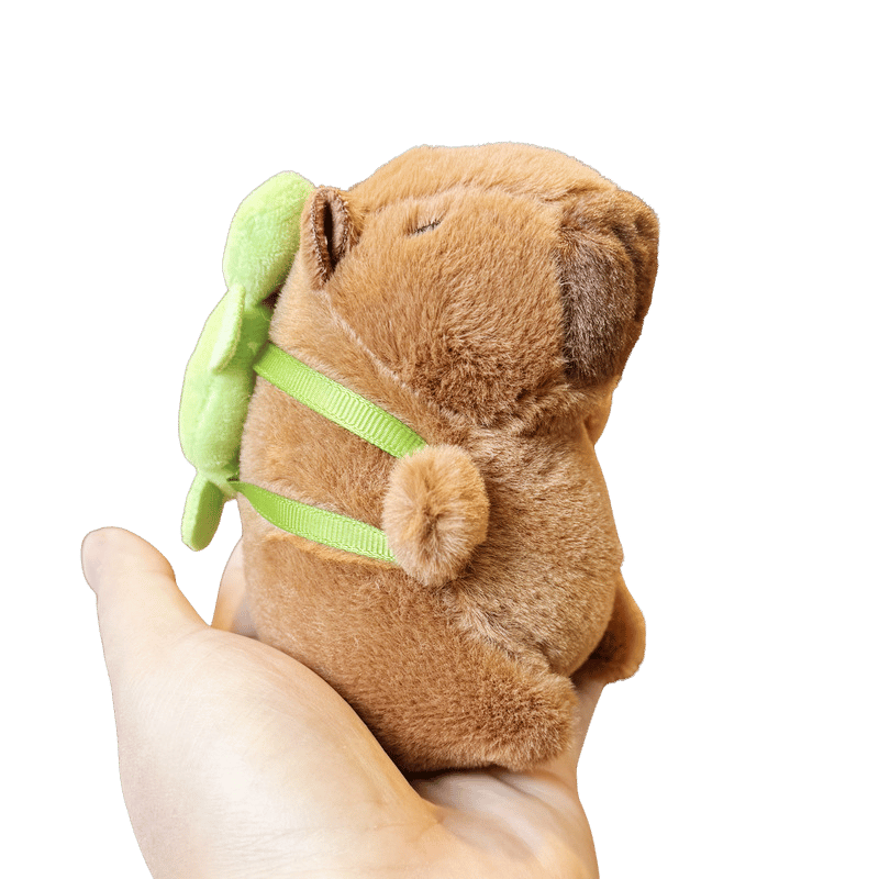 Capybara Soft Plush Turtle Backpack Modeled In Hand