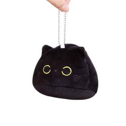 Soft black plush with embroidered yellow eyes and black ears, front-facing view keychain