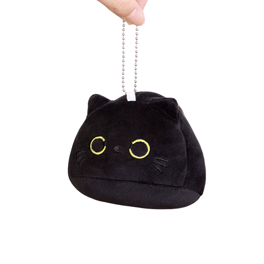 Soft black plush with embroidered yellow eyes and black ears, front-facing view keychain